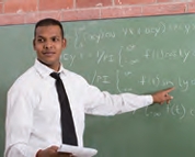 Teacher at blackboard